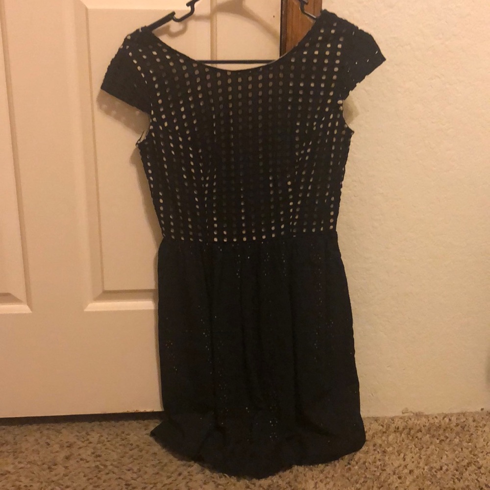 I’m selling a black dress showing the back